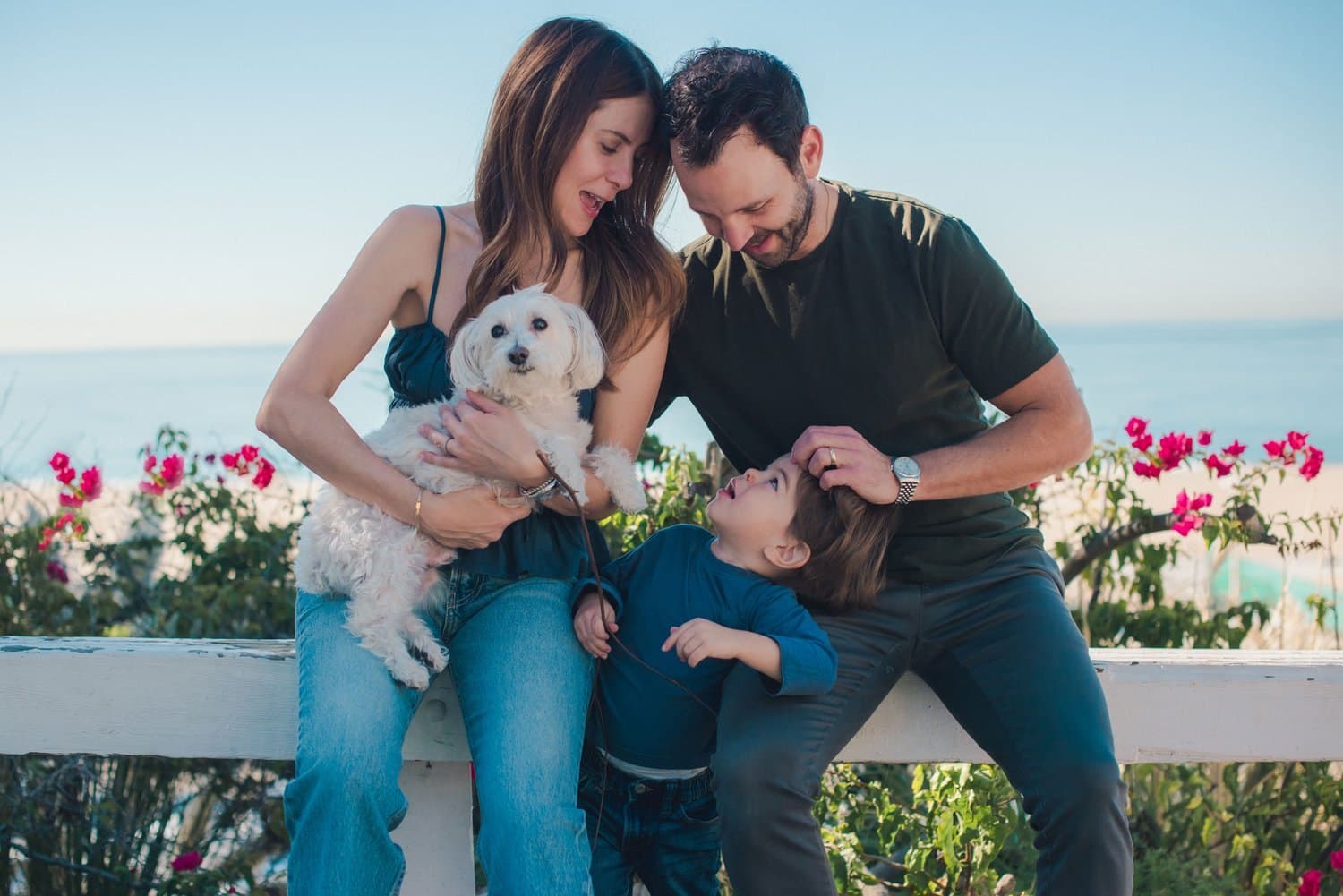 Family portrait with dog on the waterfront