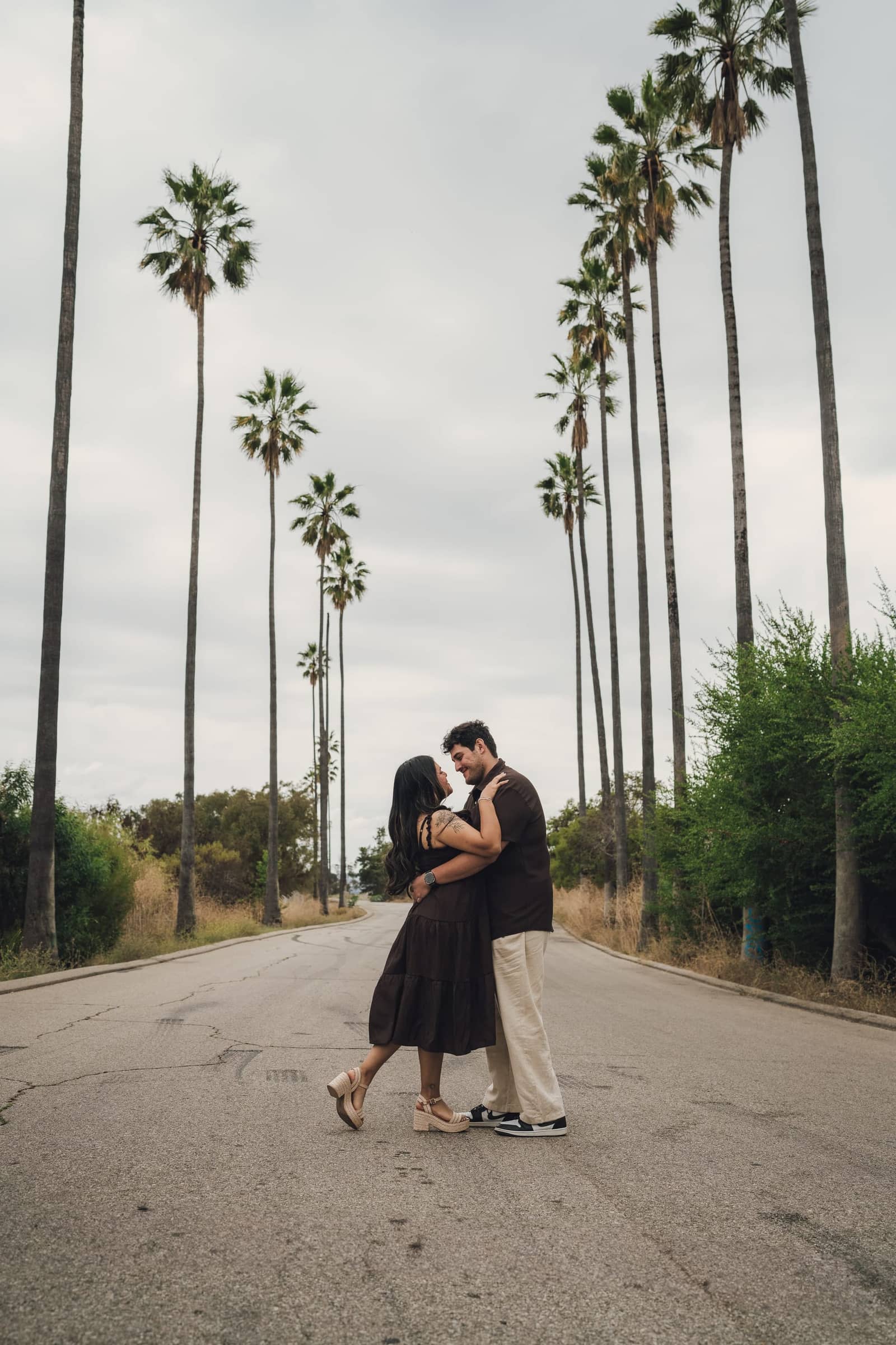 Engagement session on a palm-lined Los Angeles street