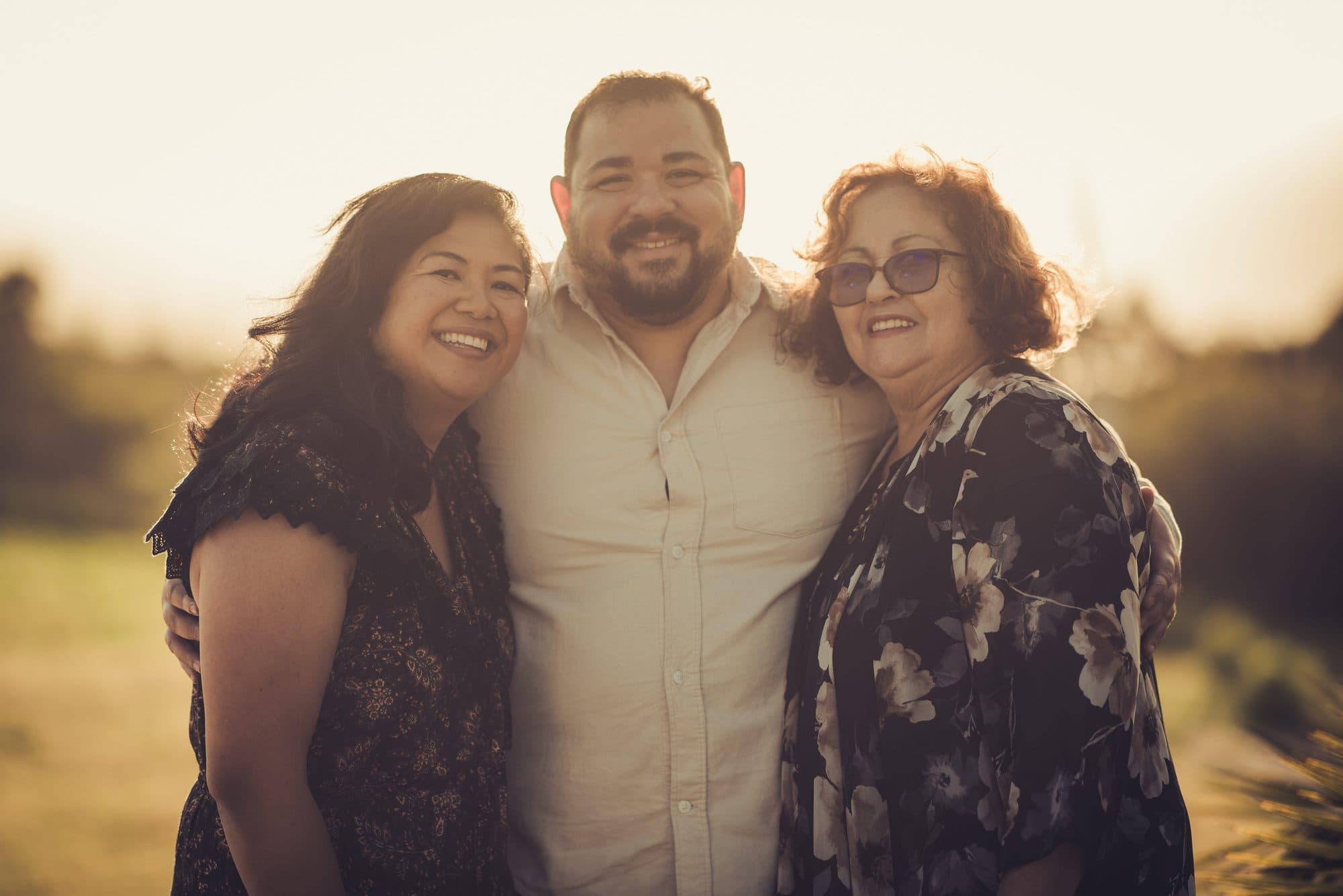Three generations together at golden hour