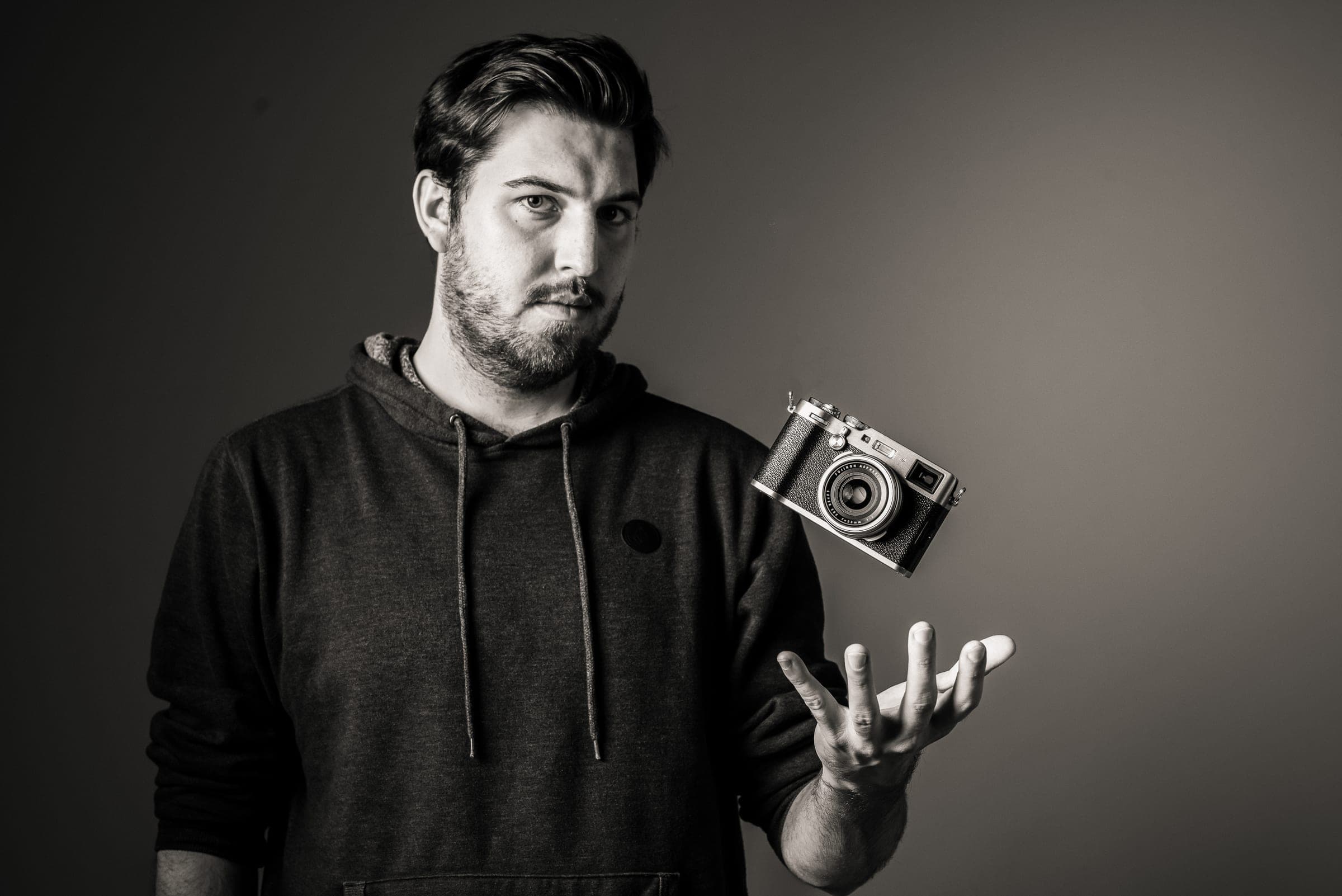 Studio portrait with camera
